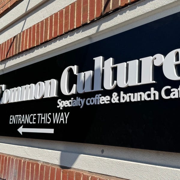 Sleek Black and White Acrylic Sign for Common Culture Coffee in Fairfax