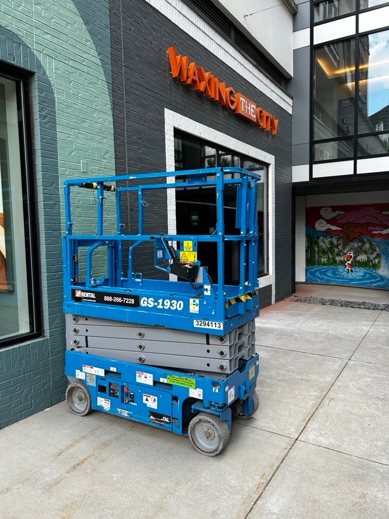 Channel Letter Sign Installation for Waxing the City at Mosaic District