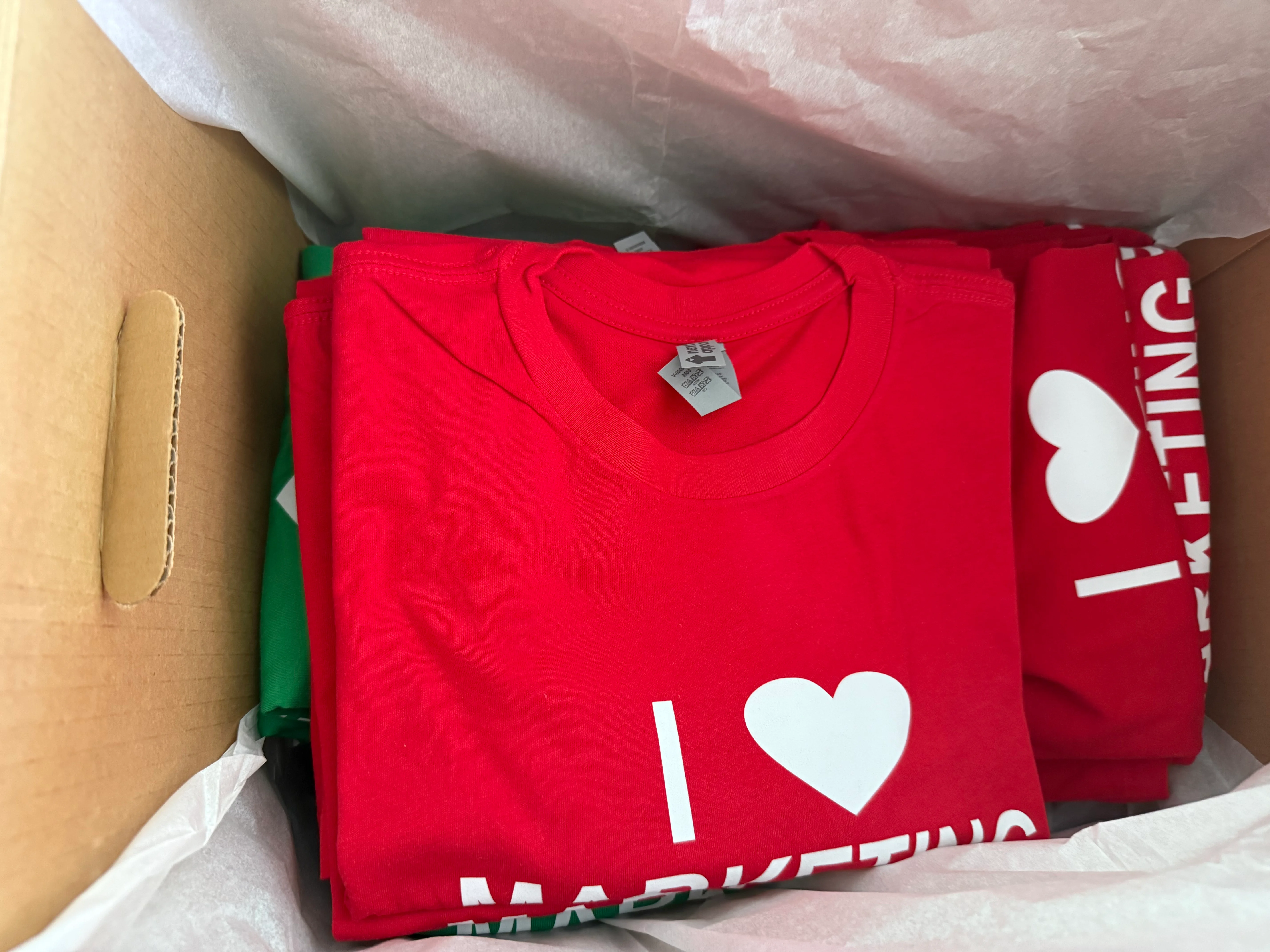 Stand Out at Your Next Event with Custom Branded T-Shirts & Hats