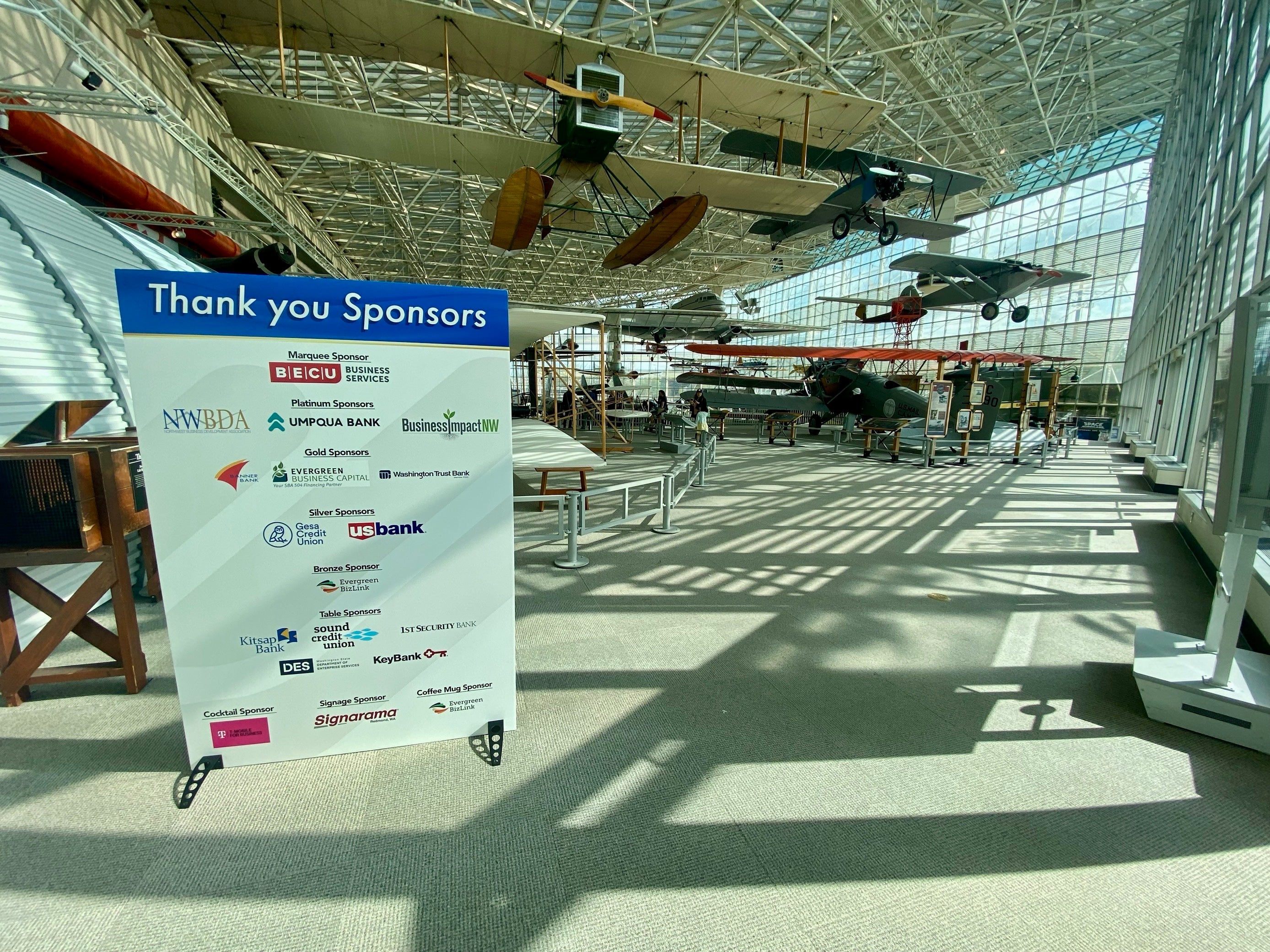 The Power of Event Signage: Why Every Great Event Needs Exceptional Visual Communication - SCORE Gala, Seattle, WA
