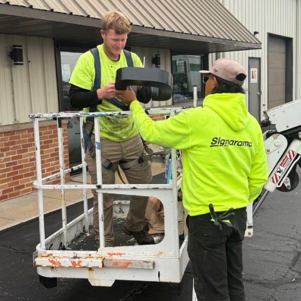 Signarama Employees Installing Channel Letters