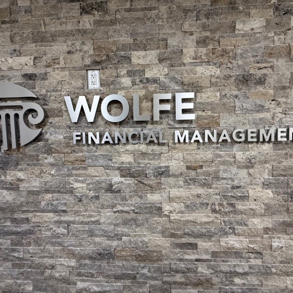 Wolfe Financial Lobby Sign Lake Mary Florida
