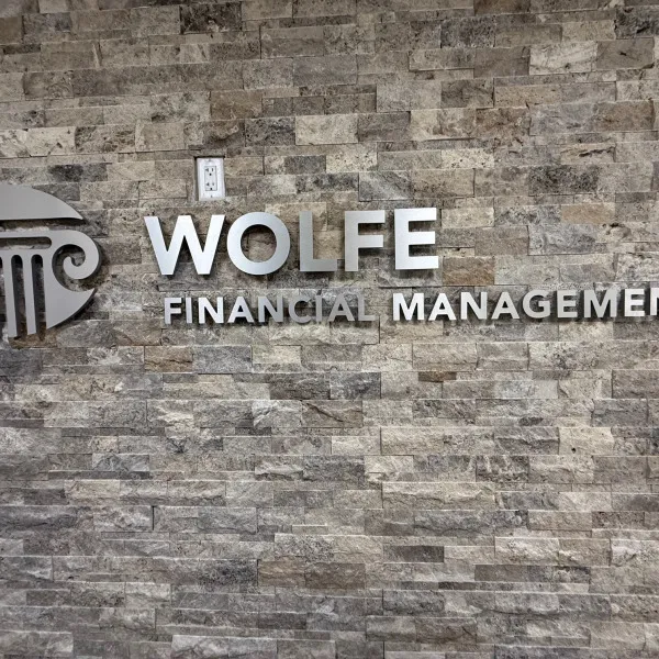 Wolfe Financial Lobby Sign Lake Mary Florida