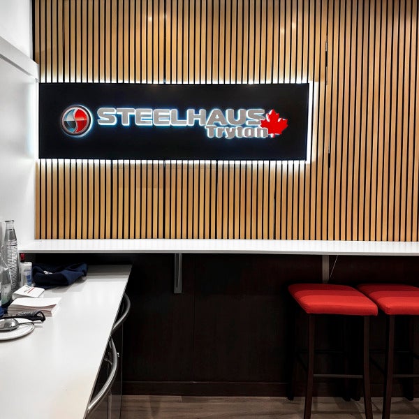 Steelhaus Tryton - Saddledome Suite Sign