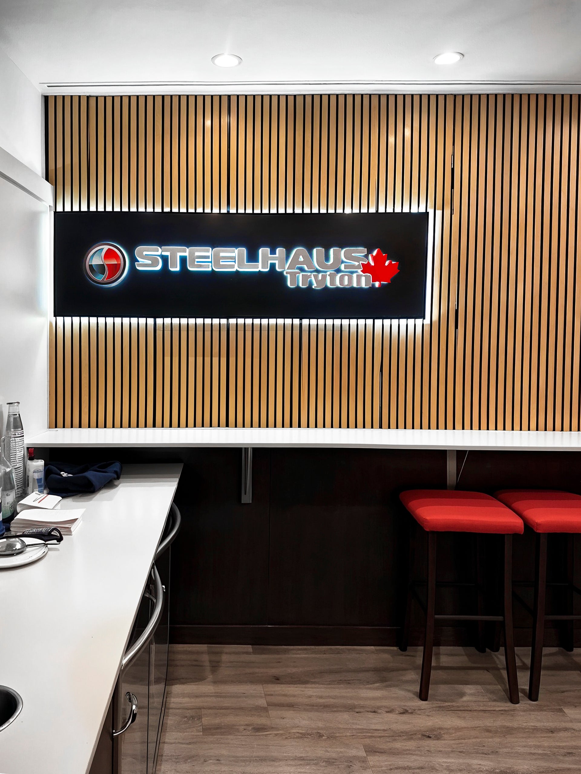 Steelhaus Tryton - Saddledome Suite Sign