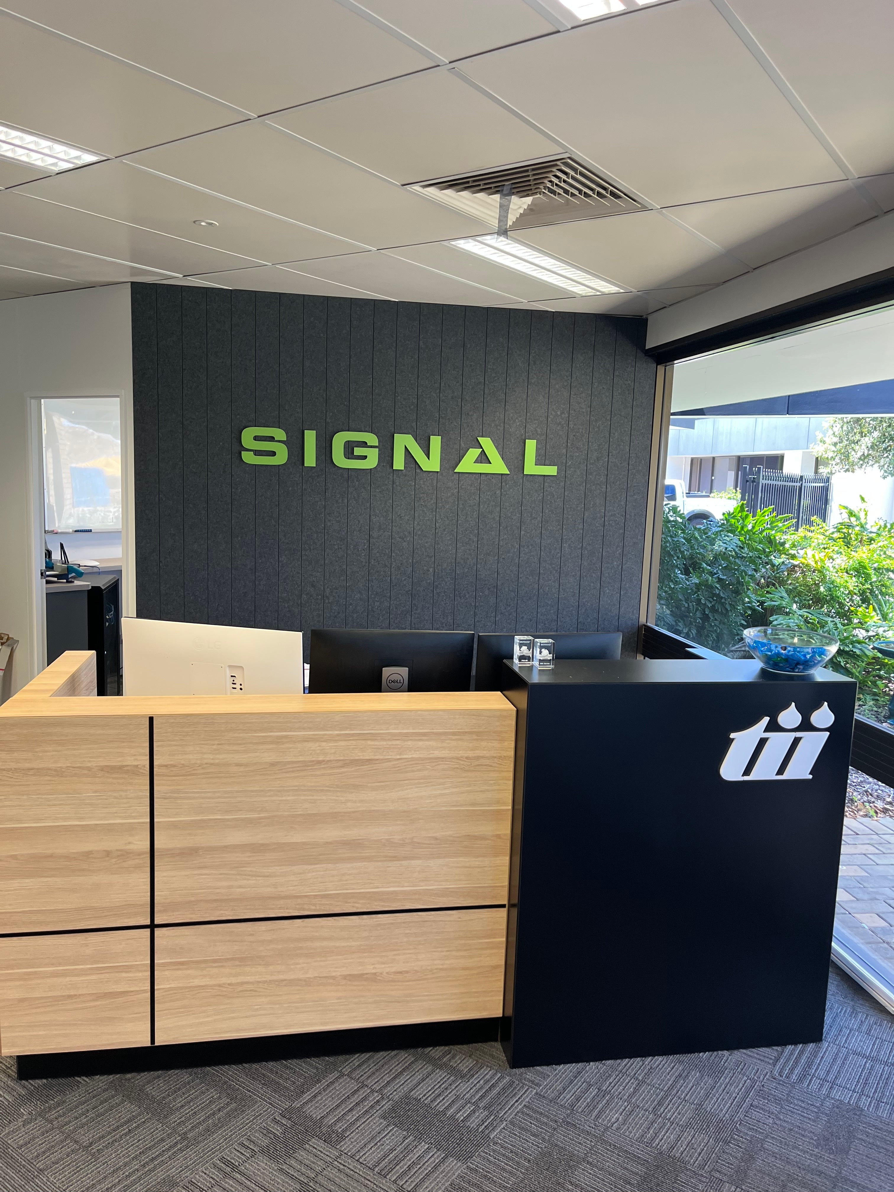 Fresh, Modern Reception Signage for Signal and Tii