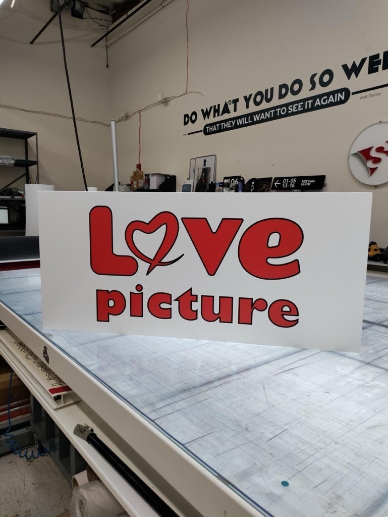 Love Picture Opens in Southcente Mall, Tukwila, WA - Storefront Signs