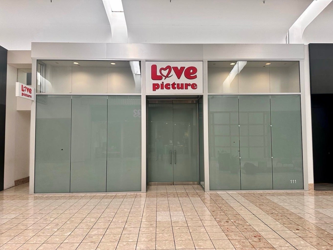 Love Picture Opens in Southcente Mall, Tukwila, WA - Storefront Signs