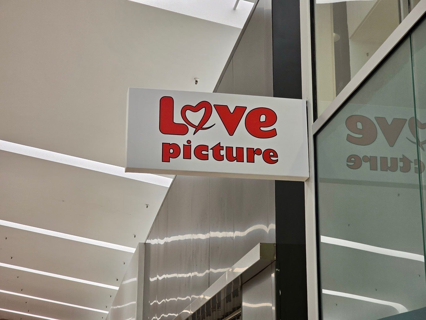 Love Picture Opens in Southcente Mall, Tukwila, WA - Storefront Signs