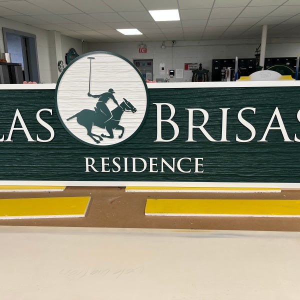 Las Brisas Residence sign straight on