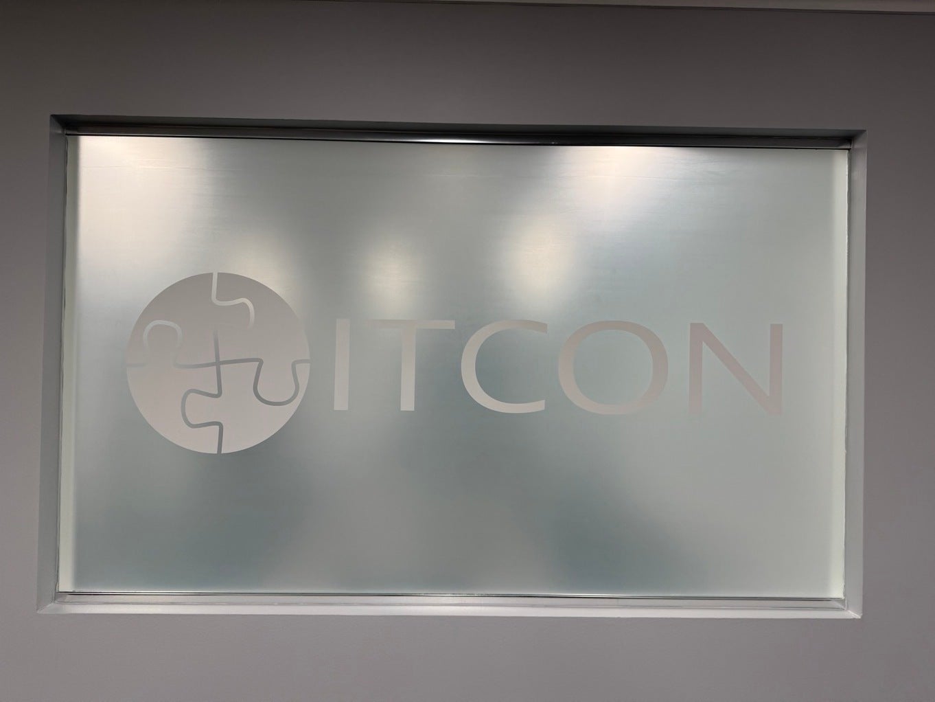 Transforming ITCON’s Vienna Headquarters: Frosted Conference Rooms & Modern ADA Signage by Signarama Tysons Corner
