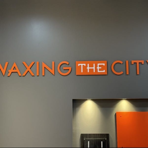 Inside the Build-Out: Wall Murals, ADA Signs & Vinyl Graphics for Waxing the City