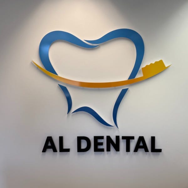 AL Dental Vienna Gets New Acrylic Lobby Sign and Door Frosting