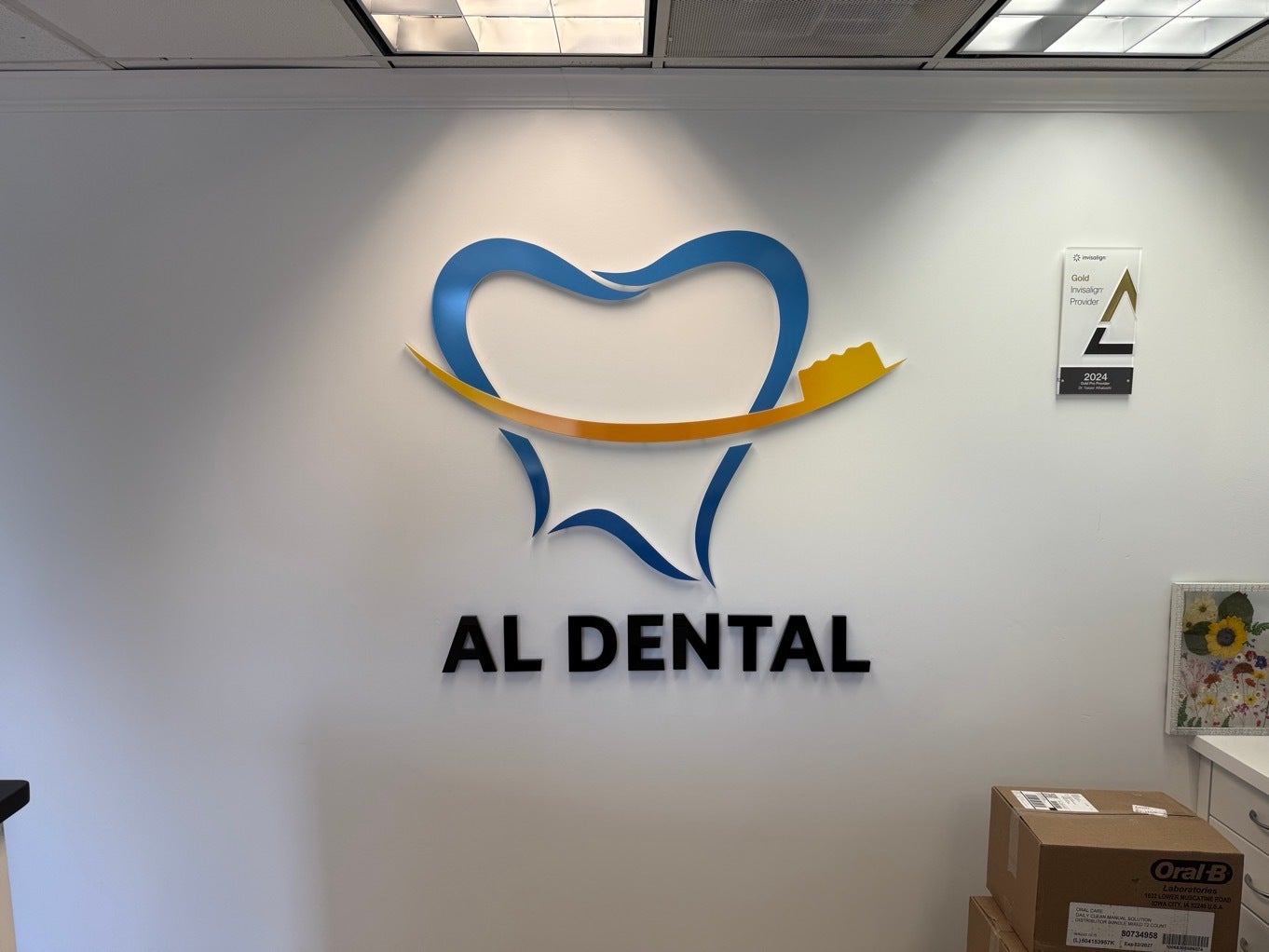 AL Dental Vienna Gets New Acrylic Lobby Sign and Door Frosting
