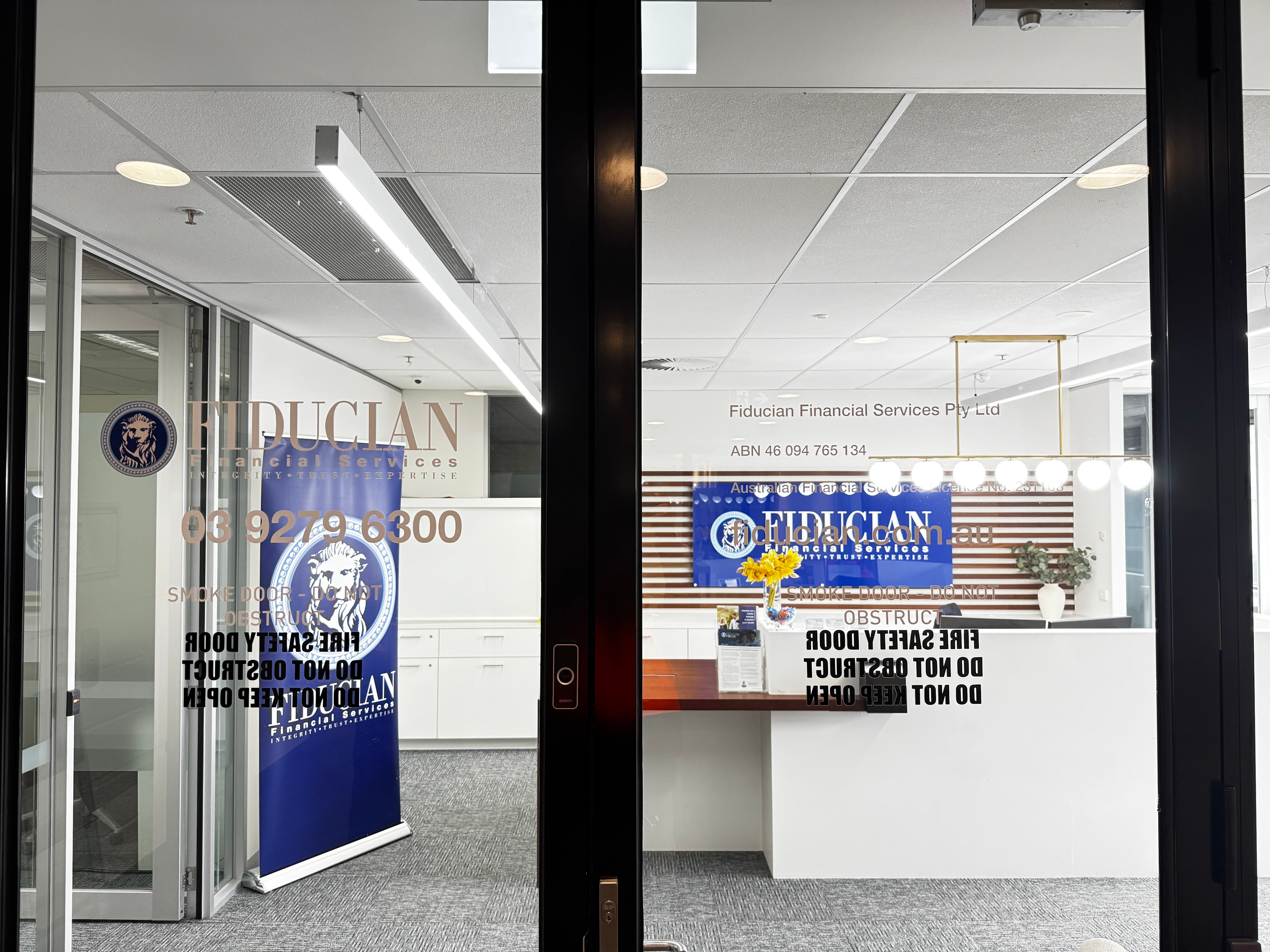 Fiducian’s New Look: Reception Sign, Door Graphic & Pull-Up Banner