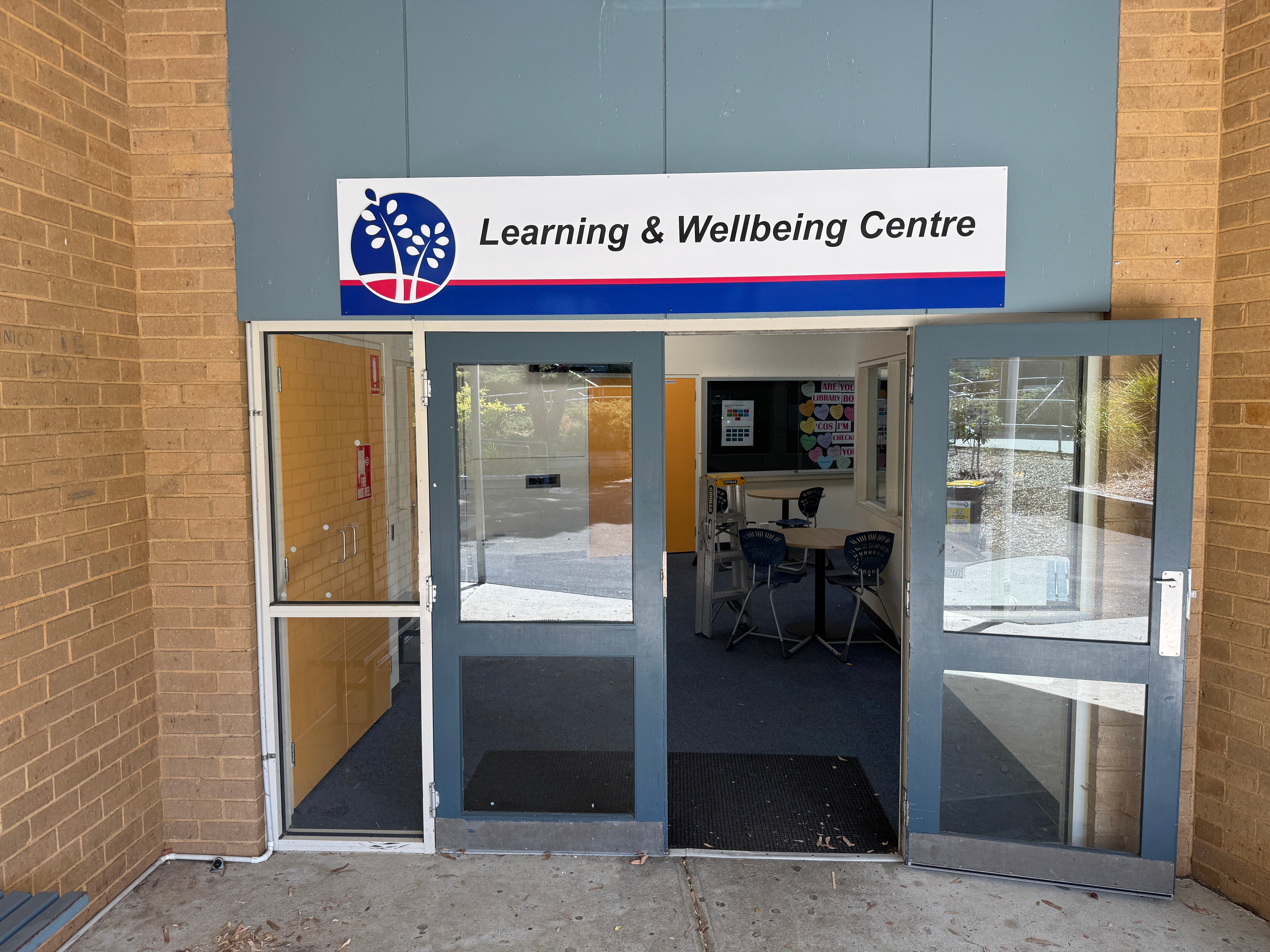 Bold Mixed-Media Fascia Sign Elevates Secondary School Entrance