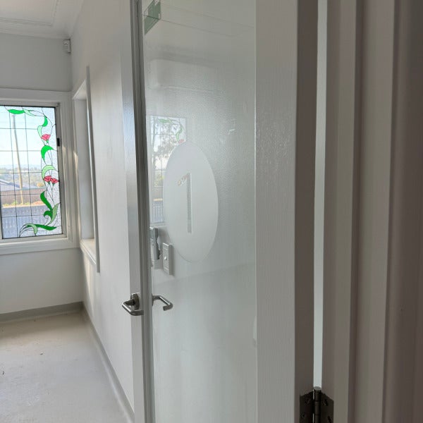 Frosted to Perfection: Custom-Cut Door Graphics