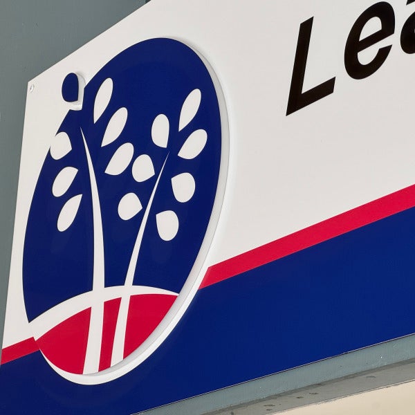 Bold Mixed-Media Fascia Sign Elevates Secondary School Entrance
