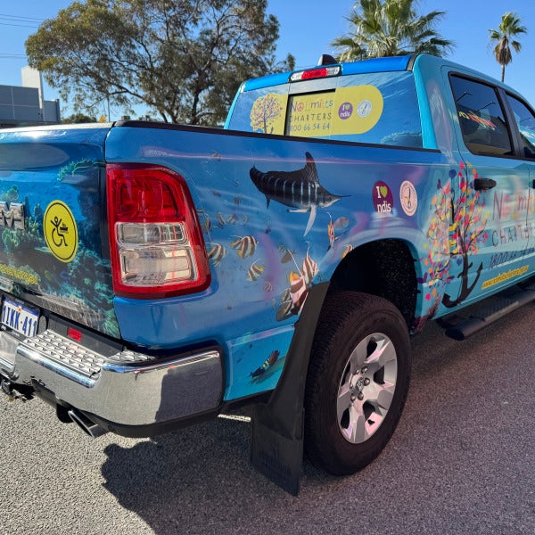 Vibrant Vehicle Wrap for No Limitts Charters by Signarama Malaga