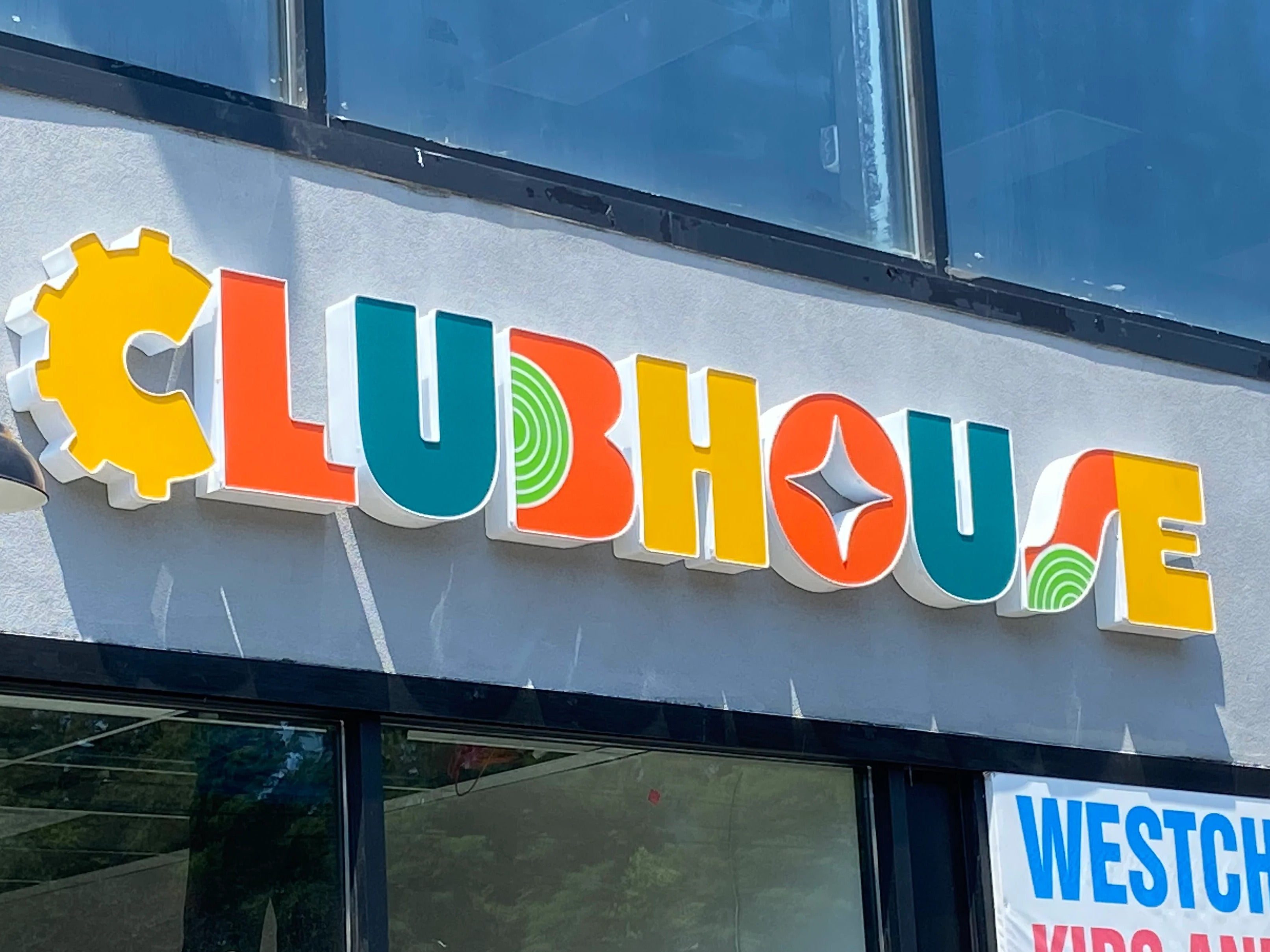 Internally Illuminated Channel Letters & Feather Flags for Clubhouse Central in Hartsdale, NY