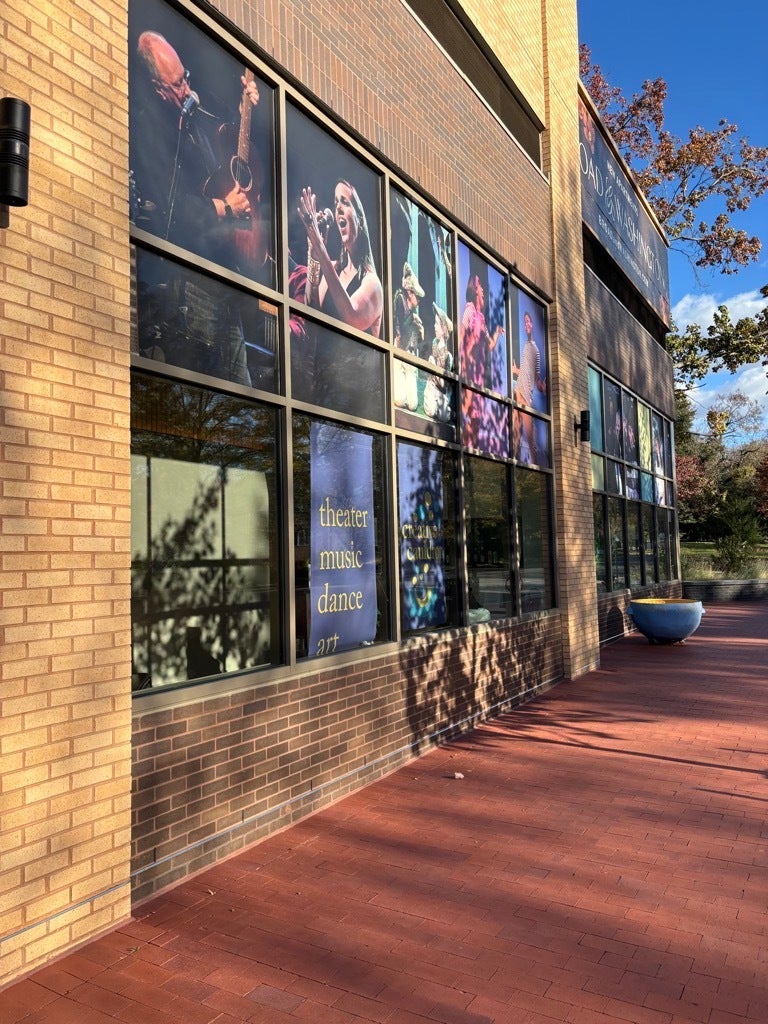Creative Cauldron Window Perf Mural Installation | Vibrant Theater Branding in Falls Church
