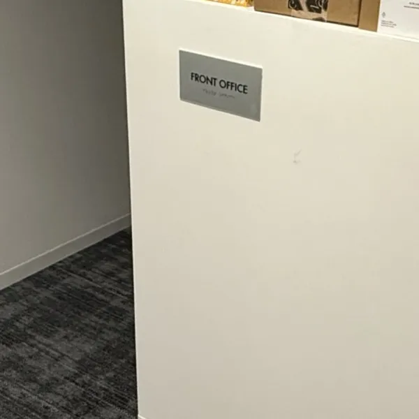 Premium Stainless Steel Room Signs for The Amatriot Group: Elevating a Modern Office Space