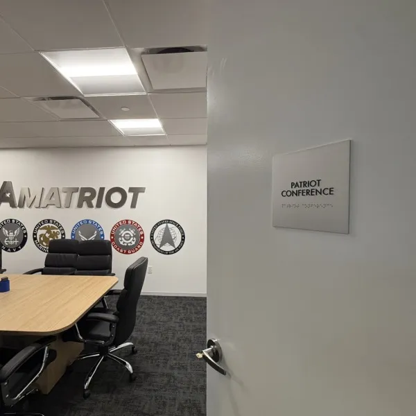 Premium Stainless Steel Room Signs for The Amatriot Group: Elevating a Modern Office Space