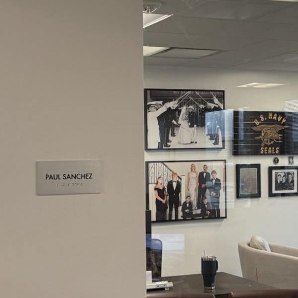 Premium Stainless Steel Room Signs for The Amatriot Group: Elevating a Modern Office Space