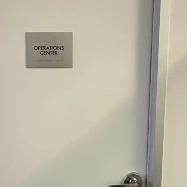 Premium Stainless Steel Room Signs for The Amatriot Group: Elevating a Modern Office Space