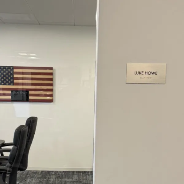 Premium Stainless Steel Room Signs for The Amatriot Group: Elevating a Modern Office Space