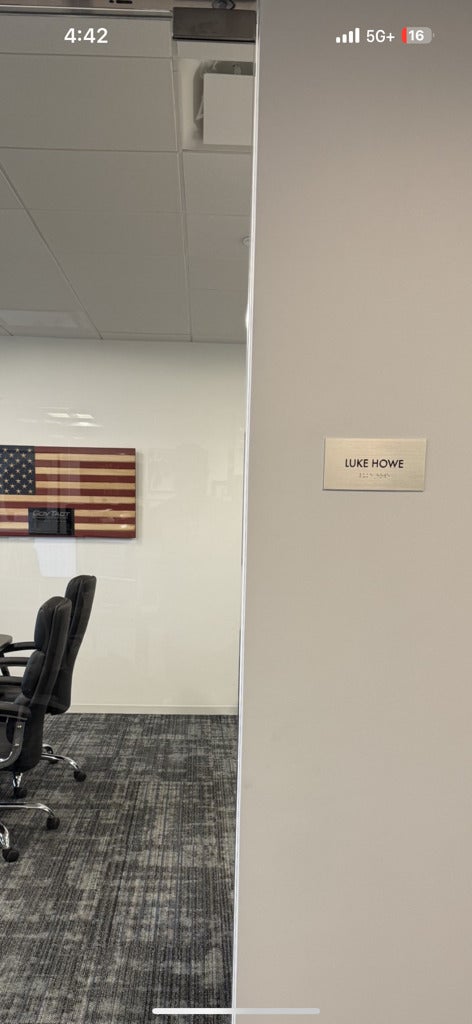 Premium Stainless Steel Room Signs for The Amatriot Group: Elevating a Modern Office Space