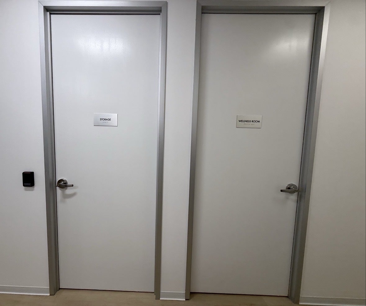 Premium Stainless Steel Room Signs for The Amatriot Group: Elevating a Modern Office Space