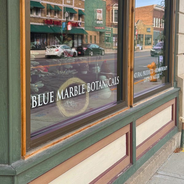 blue marble botanicals window graphics