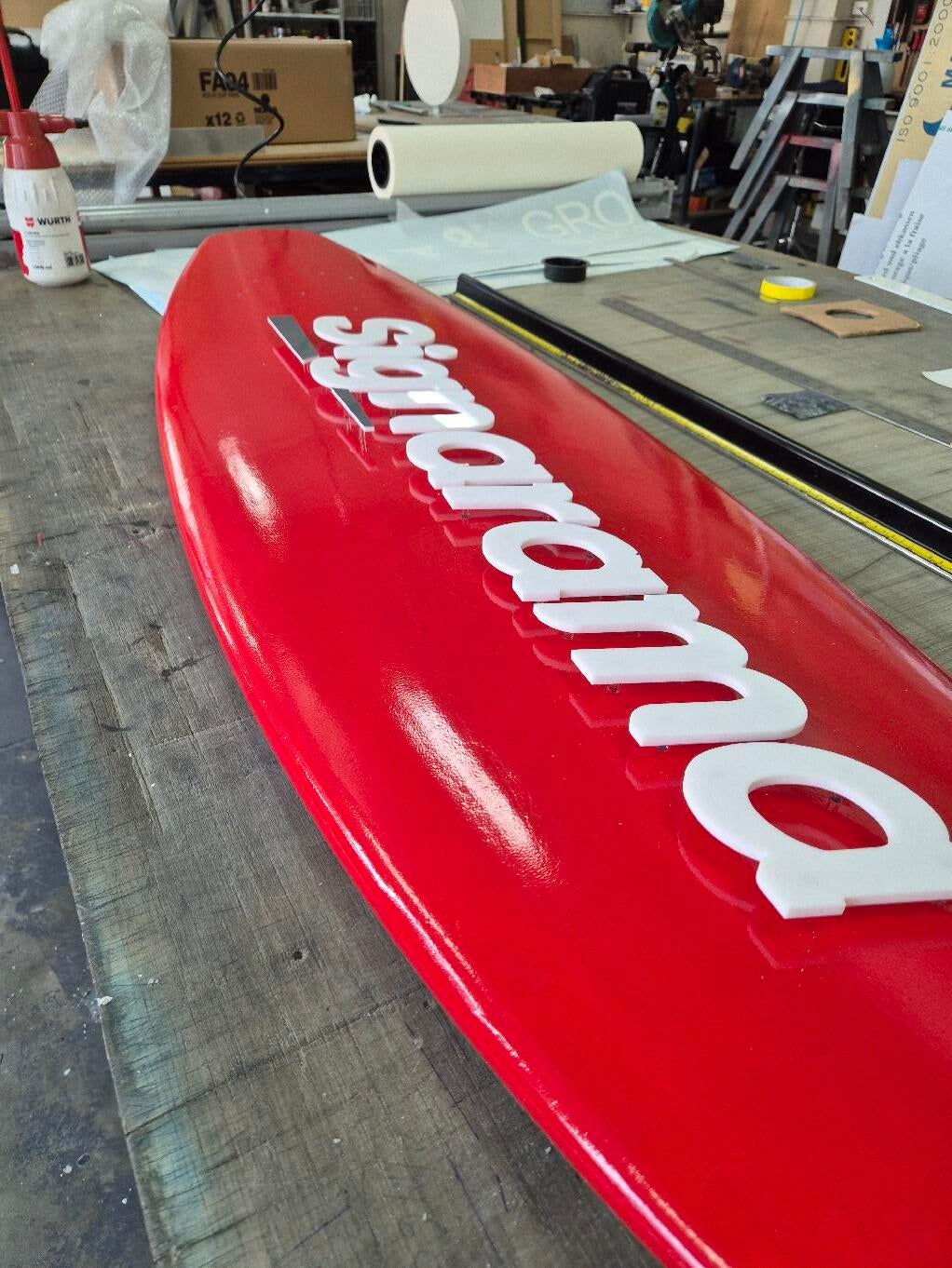 Custom signs on surfboards