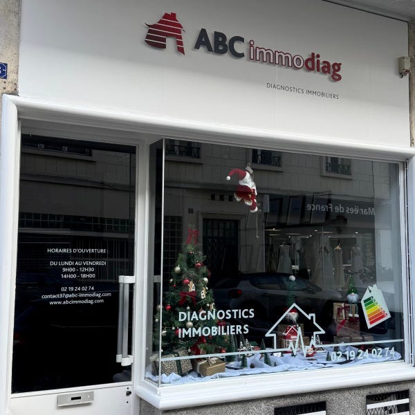 Enseigne-vitrophanie-adhésifs-vitrine-Tours-magasin