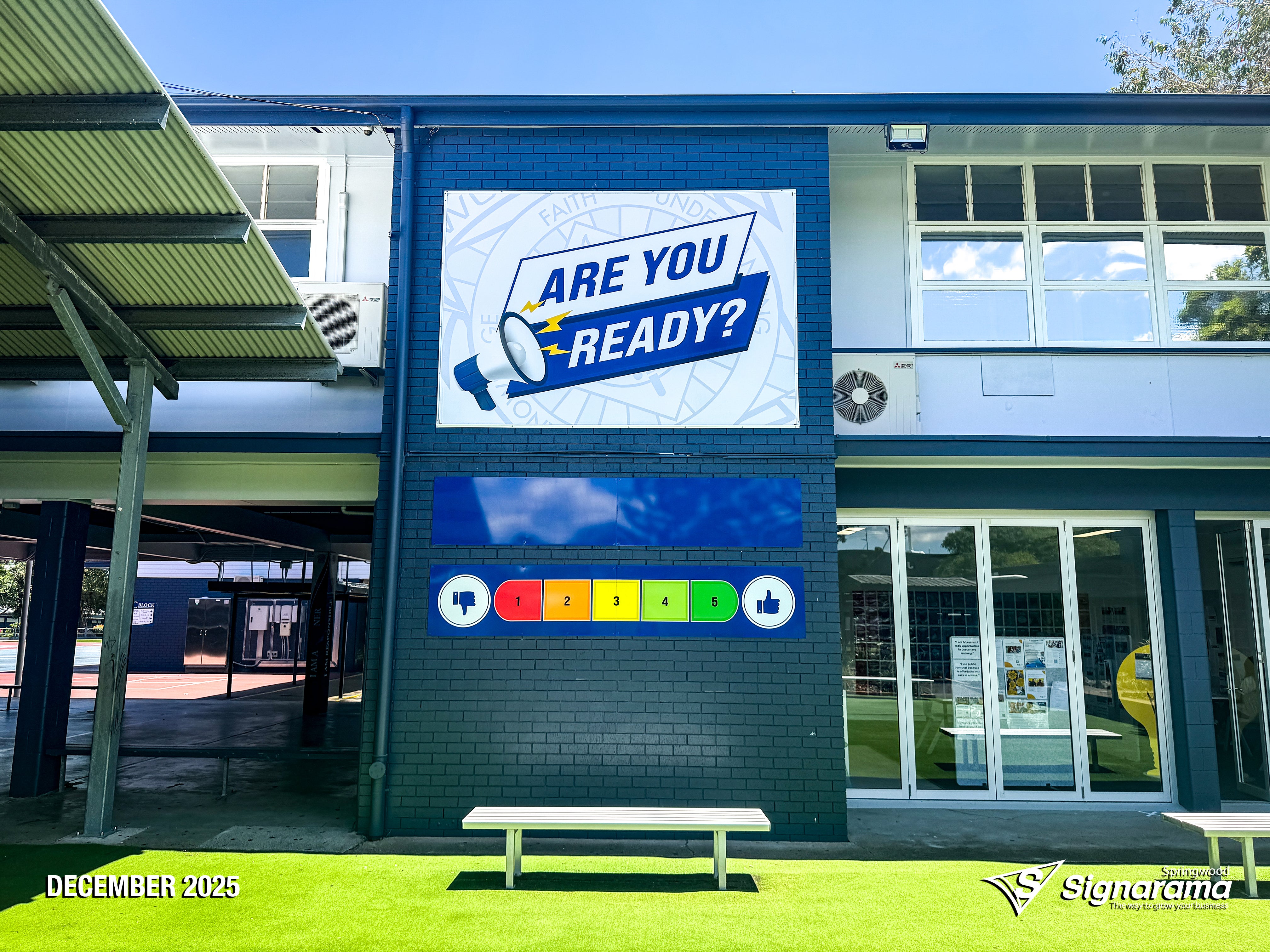 Signarama Springwood school signage with ACM panels, sailtrack banner, and window graphics for Woodridge State High School campus branding