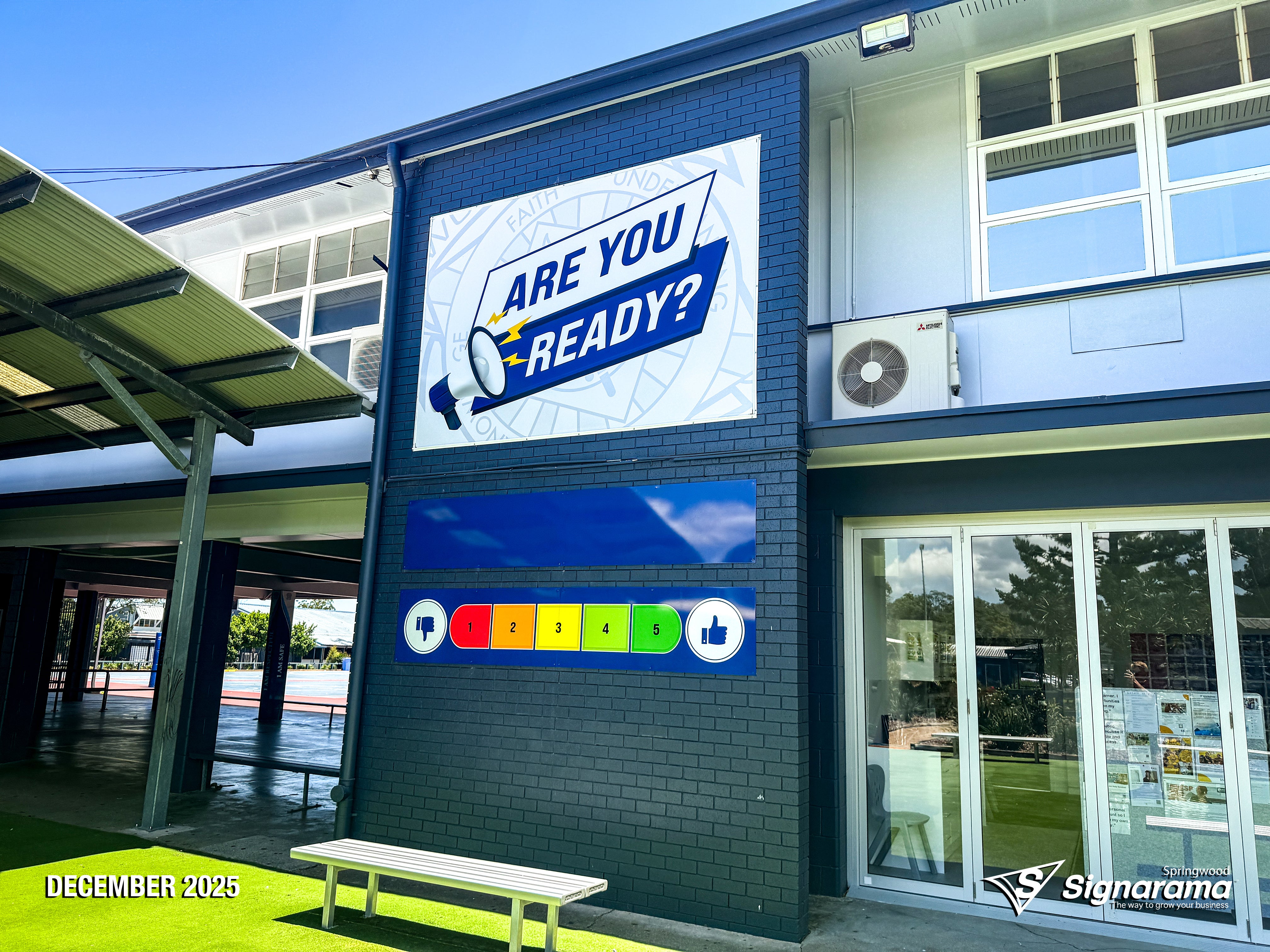 Signarama Springwood school signage with ACM panels, sailtrack banner, and window graphics for Woodridge State High School campus branding