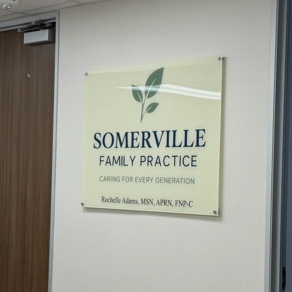 Somerville family practice lobby signs