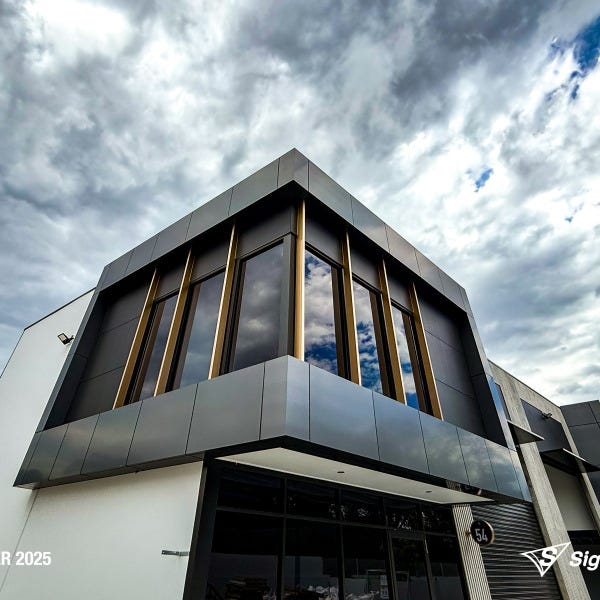 Signarama Springwood 2Pac sprayed Copper Gold building blades for Dexar Developments creating a bold architectural feature