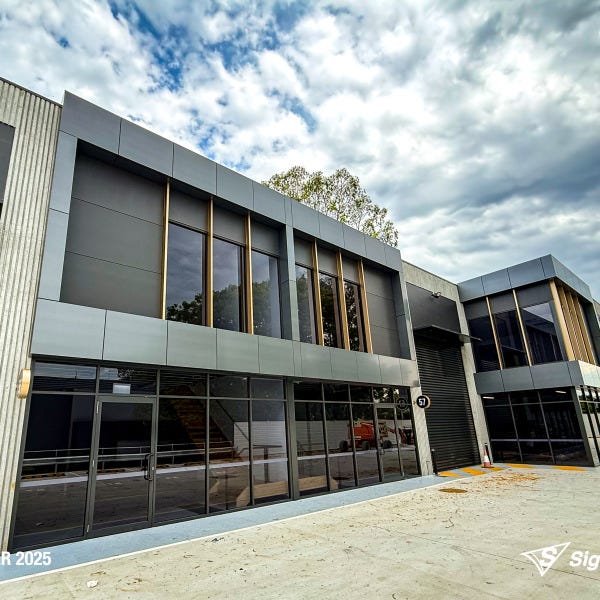 Signarama Springwood 2Pac sprayed Copper Gold building blades for Dexar Developments creating a bold architectural feature
