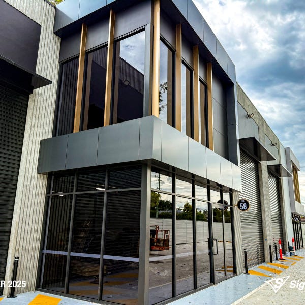 Signarama Springwood 2Pac sprayed Copper Gold building blades for Dexar Developments creating a bold architectural feature