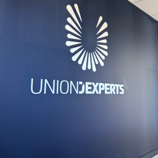 logo-interieur-pvc-adhesif-union-dexperts-plerin-by-signarama-22