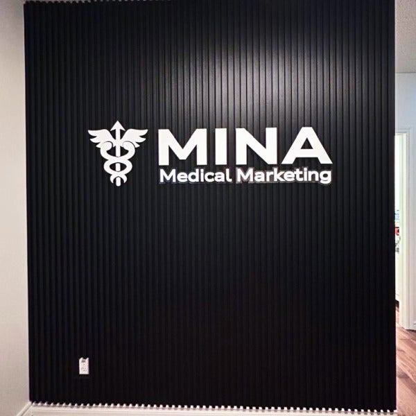 Precision Meets Texture — 3D Raised Acrylic Letters for Mina Medical Marketing’s Rugged Wall