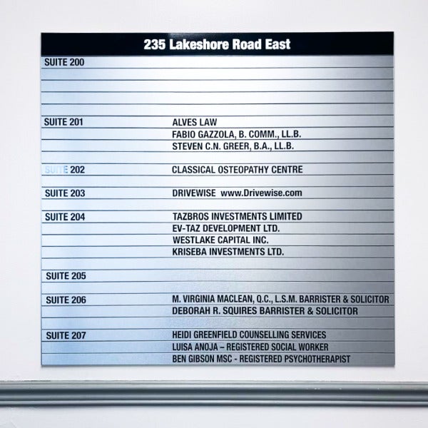 Timeless Design That Lasts — Custom Brushed Silver Directory and Suite Signs for Tazbros Investments