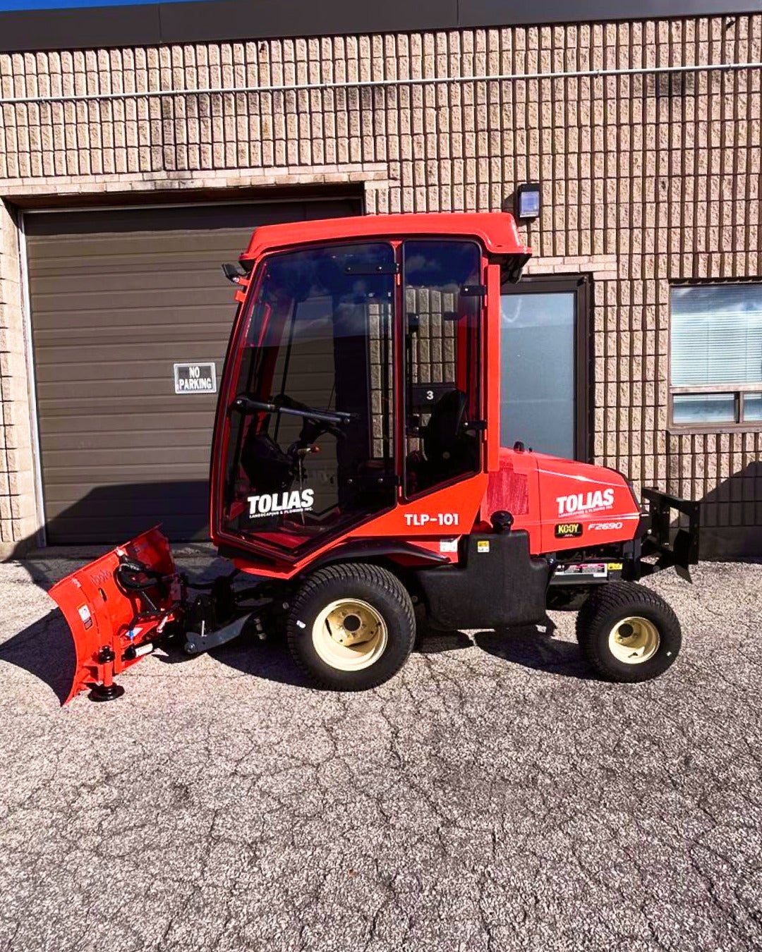 Small Machines, Big Smiles — Custom Decals and Partial Wraps for Tolias Landscaping’s Snow Plows