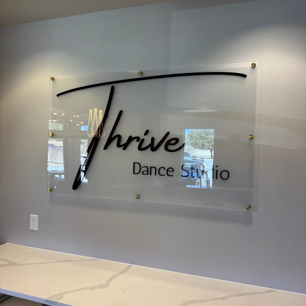 Thrive Lobby Sign