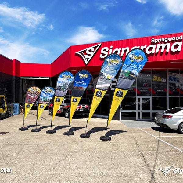 Teardrop flags designed and produced by Signarama Springwood for Ozwide Freight outdoor branding..