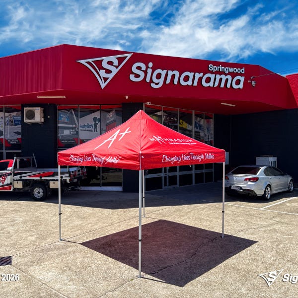Branded marquee designed and produced by Signarama Springwood for Mathnasium, featuring custom printed event tent used for outdoor promotions, school events and pop-up marketing.