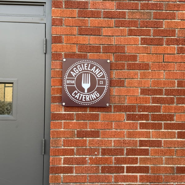 Aggieland Catering - acrylic sign on standoffs