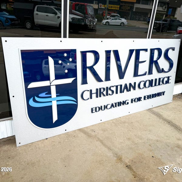 3D acrylic logo signage installed at Rivers Christian College by Signarama Springwood, featuring clean, modern dimensional lettering for a professional school reception display.
